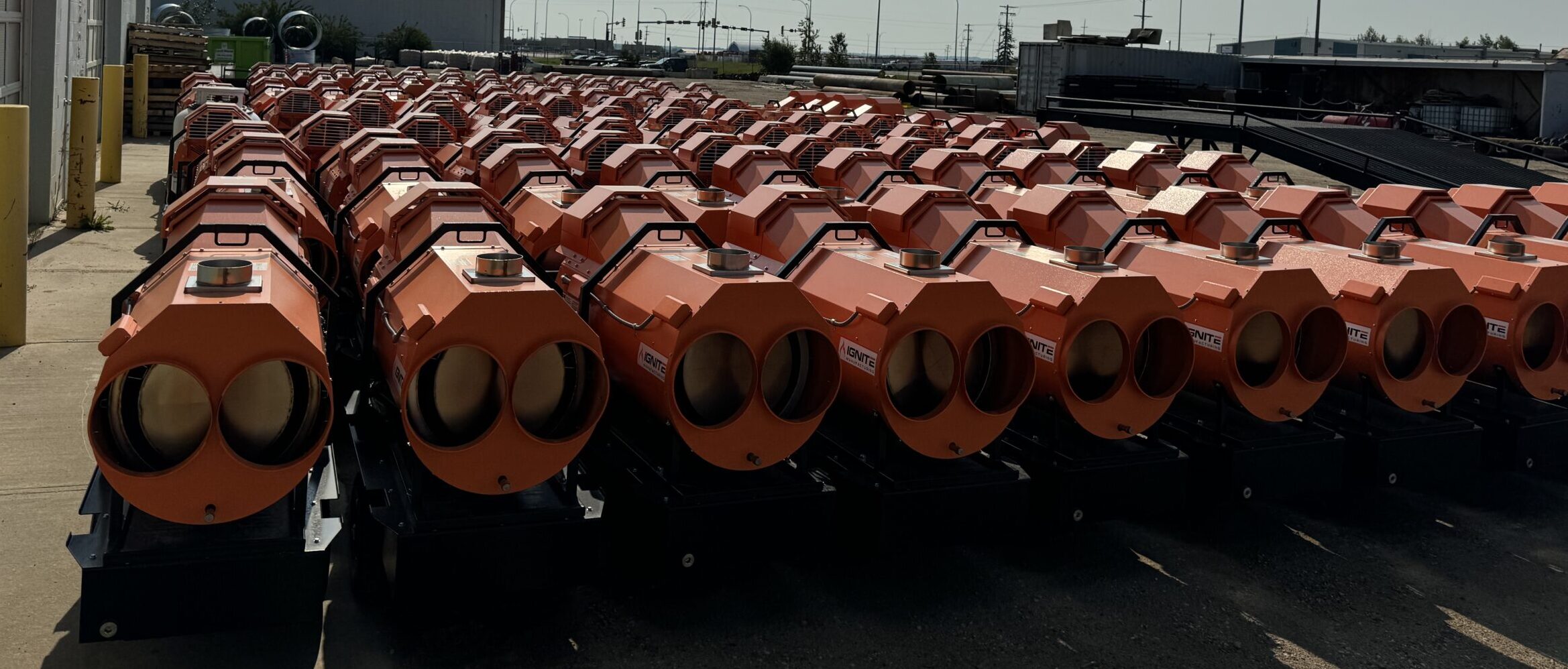 Ignite Heaters Multiple Ignite Manufacturing industrial heaters lined up outdoors, ready to be delivered and deployed at customer sites.