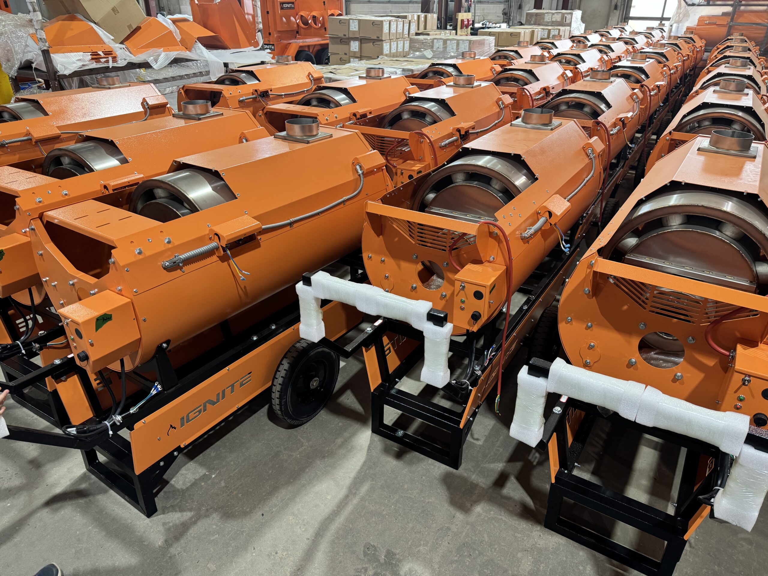 Ignite Heaters Rows of Ignite Manufacturing industrial heaters lined up in the shop, ready for shipment to customers across industries.